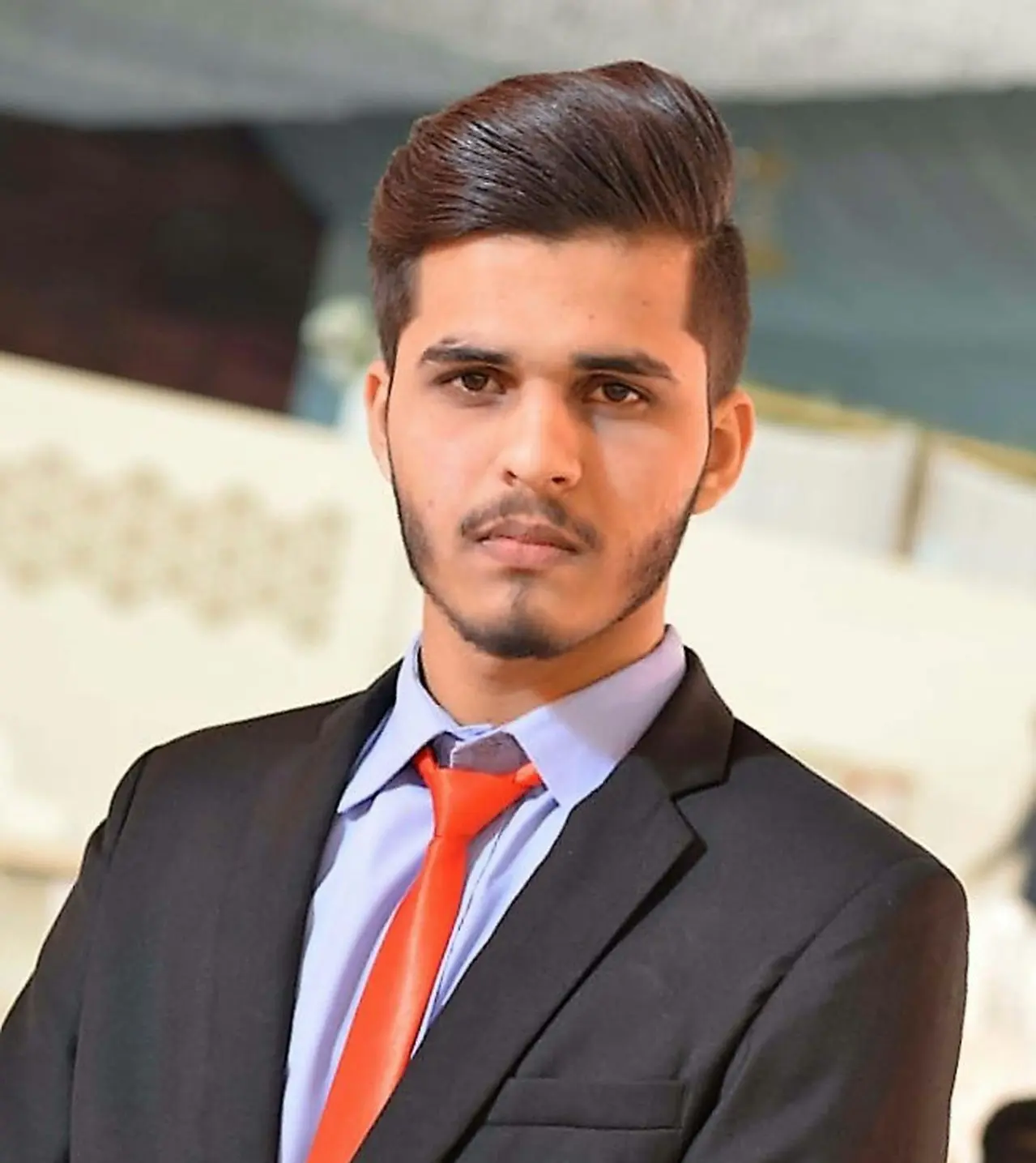 man wearing black suit jacket